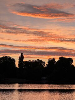 See mit Sonnenuntergang